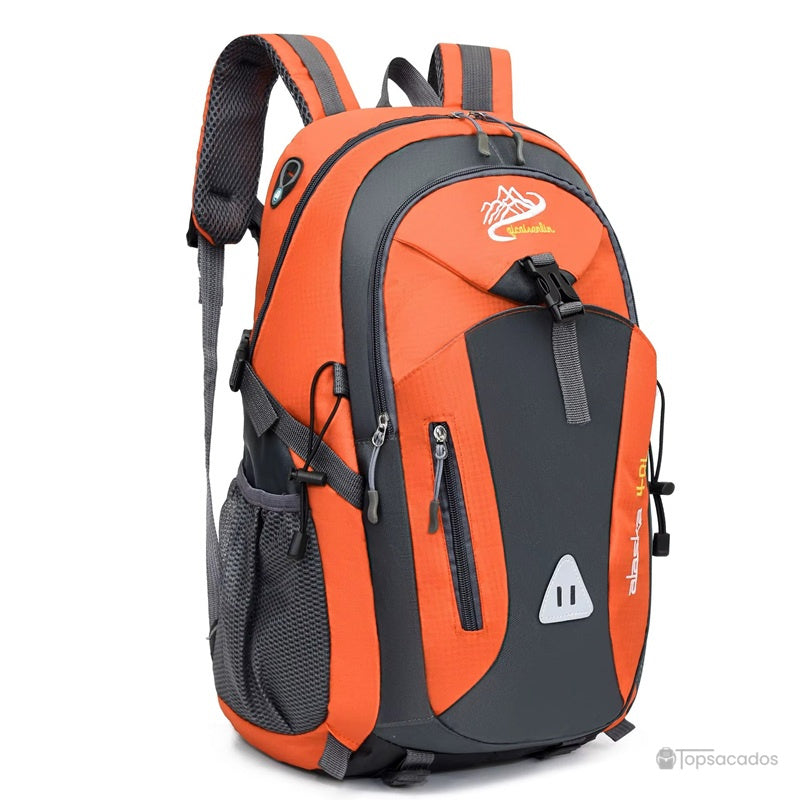 Sac à dos 40L randonnée orange vif avec empiècements gris, parfait pour la visibilité en milieu naturel