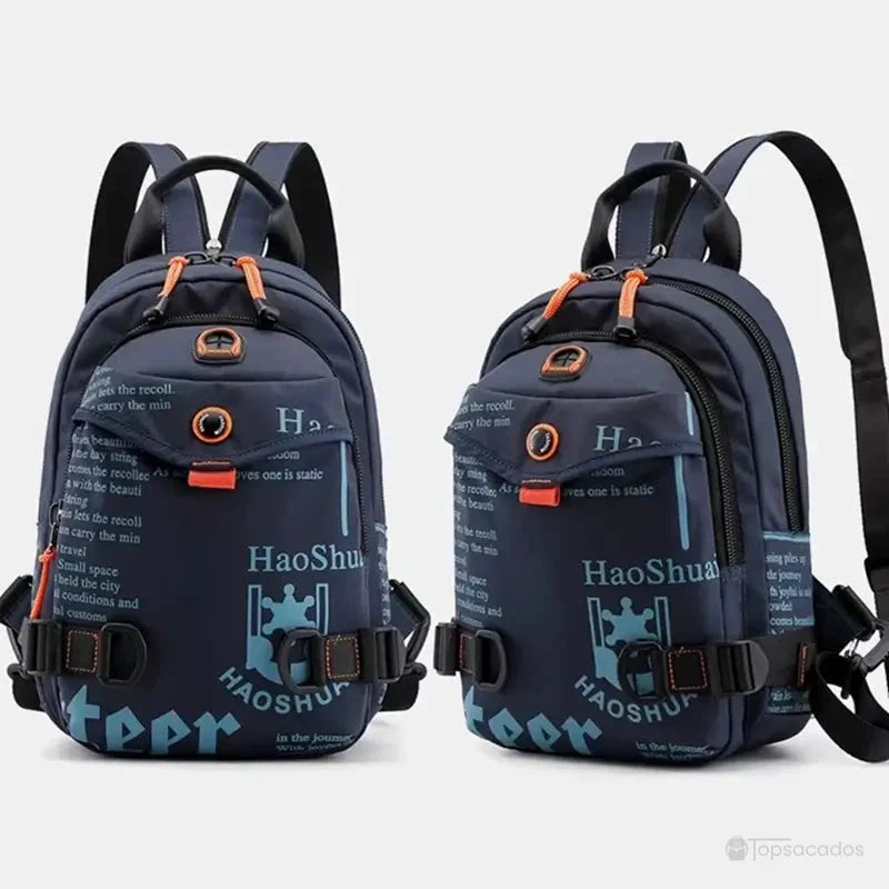 Petit Sac à dos bleu marine présenté en double vue, face et latérale, sur fond gris clair, avec éléments fonctionnels visibles