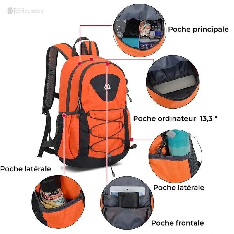 Petit Sac à dos randonnée femme avec plusieurs compartiments visibles : poche principale, poche pour ordinateur, poches latérales et poche frontale.