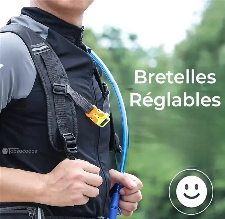 sac à dos 16 l avec bretelles réglables porté par un homme en extérieur, équipé d’un tuyau d’hydratation bleu pour activités sportives