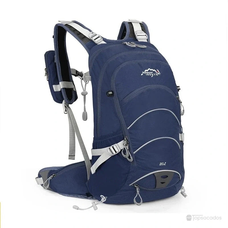 Sac à dos 20 L randonnée bleu marine 20L avec sangles grises et dos renforcé, posé de profil