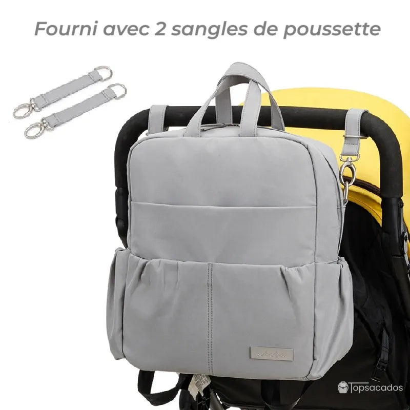 Sac à dos à langer élégant gris fixé à une poussette avec les deux sangles fournies