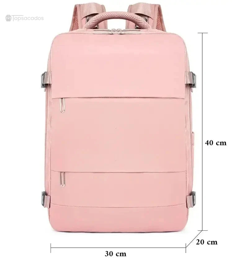 Sac a dos avion rose affichant ses dimensions exactes de 40 cm de hauteur, 30 cm de largeur et 20 cm de profondeur pour correspondre aux normes cabine.