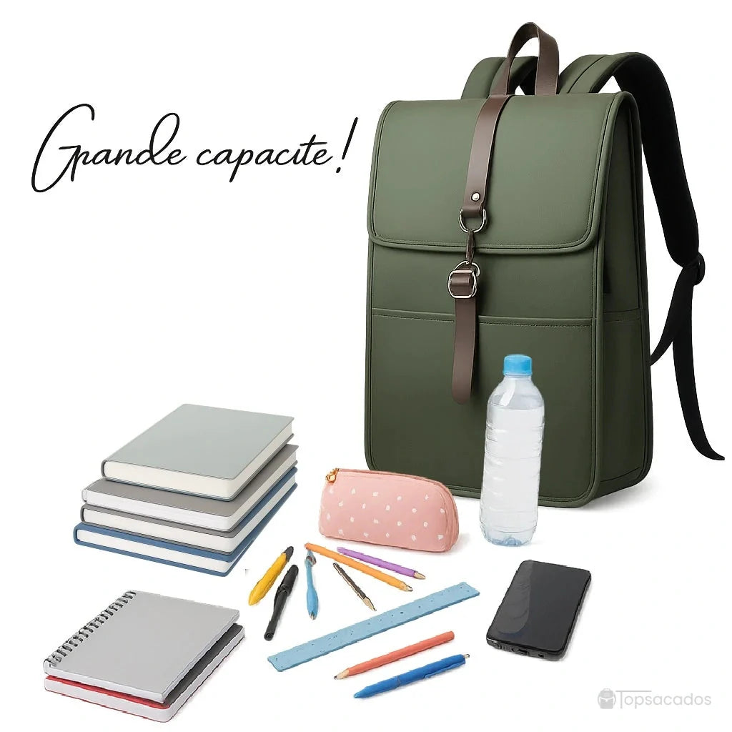 Sac à dos collège antivol fille vert avec accessoires scolaires devant, comme cahiers, trousse rose, stylos et gourde, illustrant sa grande capacité.
