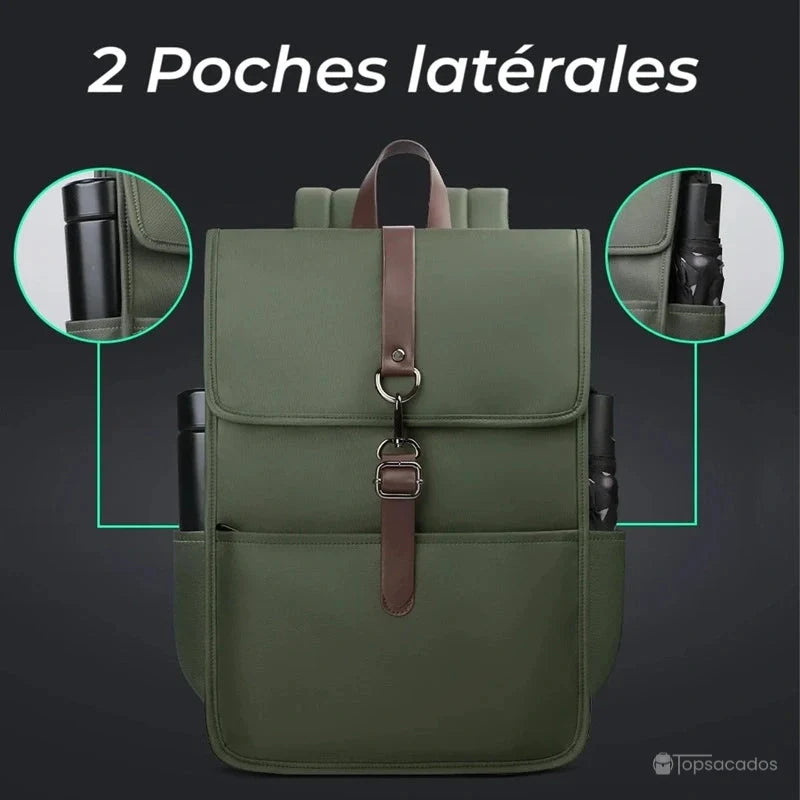 Sac à dos collège antivol fille vert avec deux poches latérales contenant une gourde et un parapluie, fond foncé contrasté.