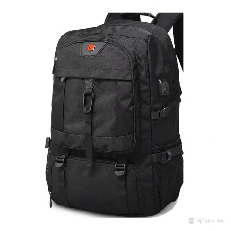 Sac à dos compartiment chaussure extensible noir avec poignée renforcée et poches frontales visibles, sur fond blanc