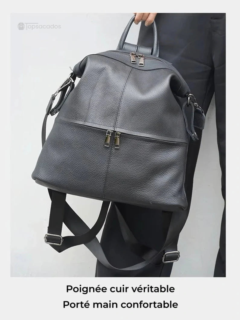 Sac à dos cuir femme noir porté à la main par sa poignée en cuir véritable, confort et élégance