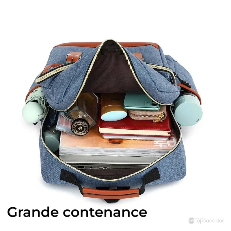 Sac à dos école garçon grande contenance ouvert, rempli de fournitures scolaires et accessoires, vu de dessus.