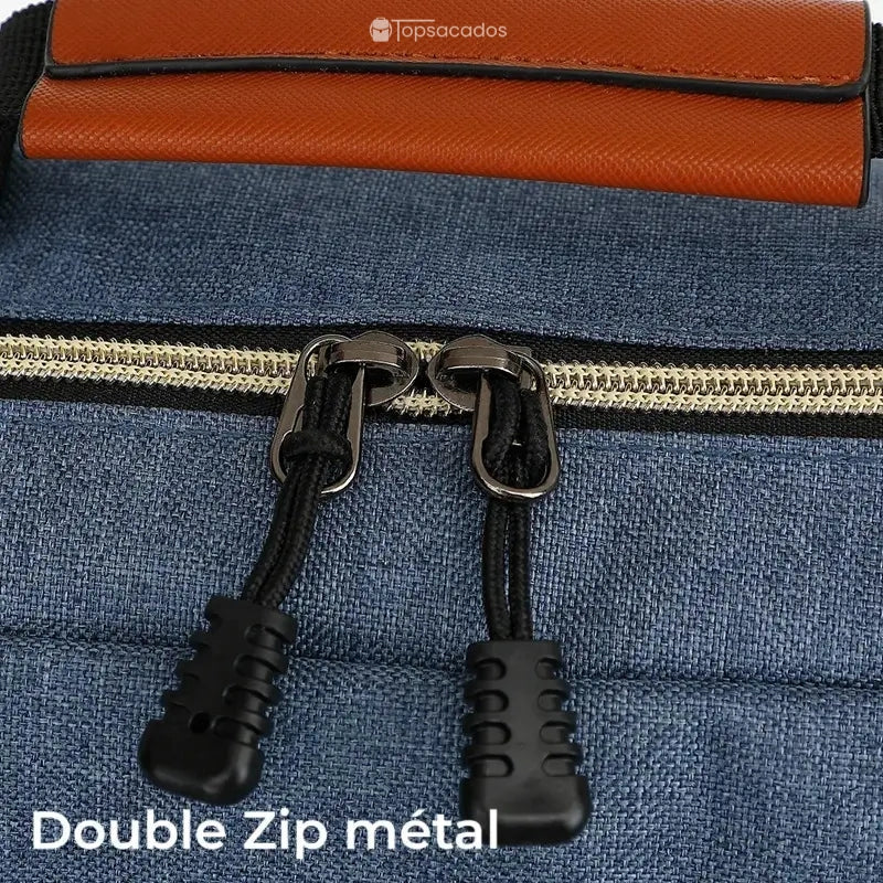Sac à dos école garçon avec gros plan sur double zip métal noir, fermeture résistante et facile à manipuler.