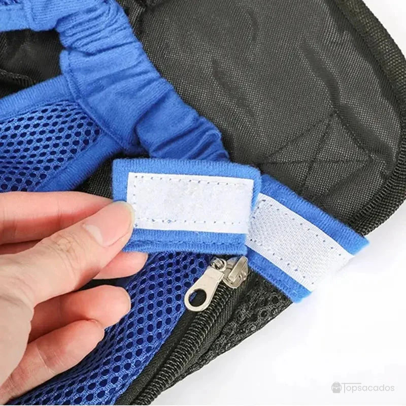 Sac à dos et ventral chat noir, vue de la base intérieure avec attache de sécurité, tissu résistant et surpiqûres visibles.