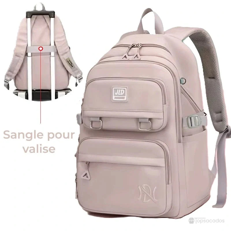 Sac à dos fille rose avec sangle arrière intégrée pour attache valise, pratique pour les voyages