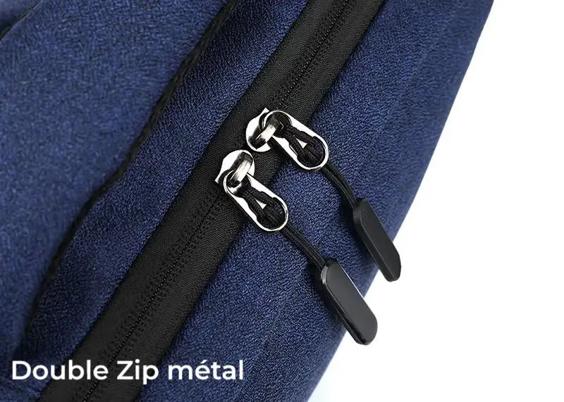 Sac à dos ordinateur Homme équipé d’une fermeture double zip en métal noir et argent, vue rapprochée.