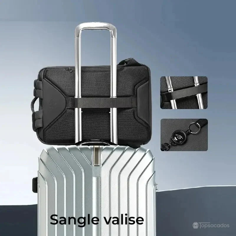 Sac à dos ordinateur portable design fixé sur une poignée de valise grâce à une sangle horizontale intégrée, idéal pour les voyages.