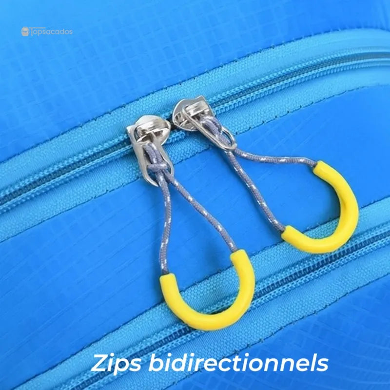 Sac-a-dos-bebe-petite-randonnee gros plan sur les zips bidirectionnels jaunes et résistants.