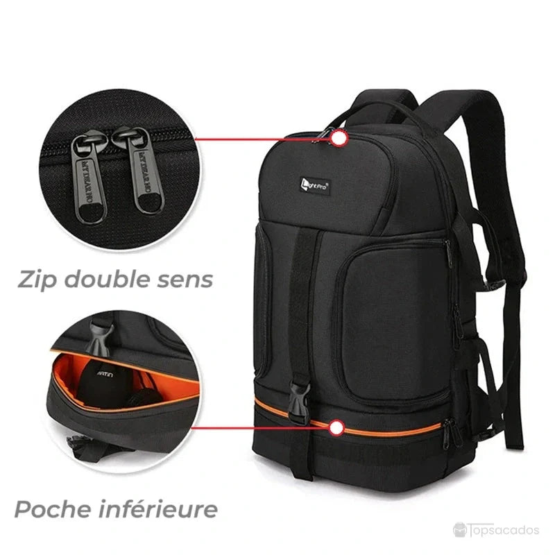 Sac à dos photo noir vu de face, zoom sur les fermetures éclair double sens et la poche inférieure ouverte avec doublure orange