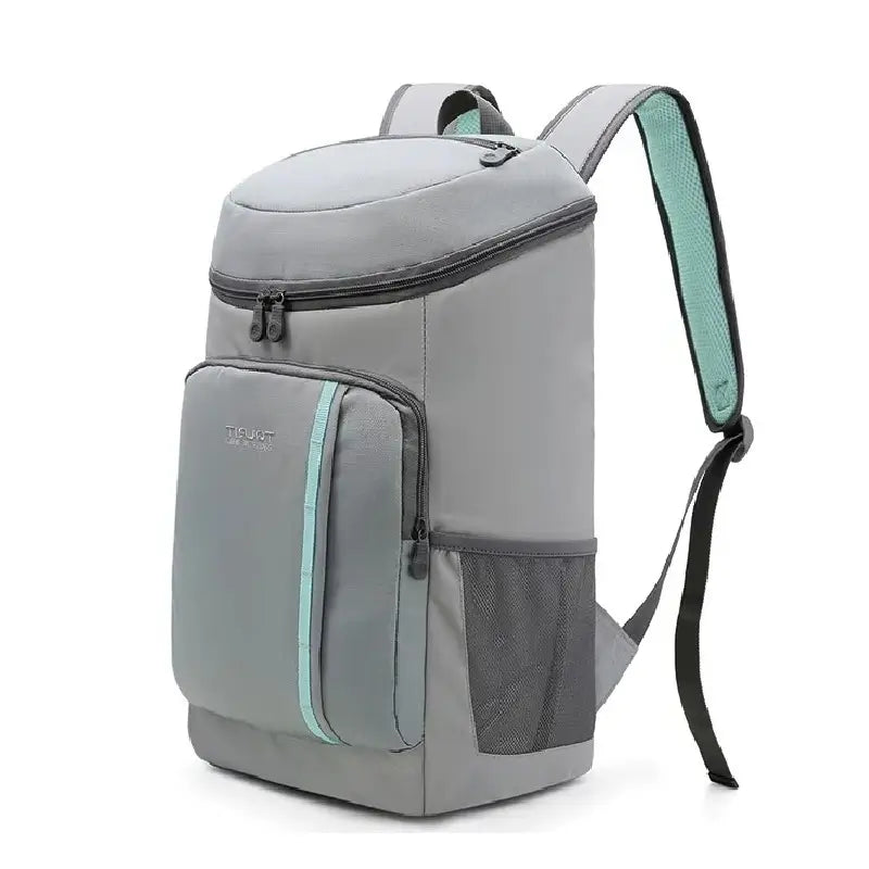 Sac à dos picnic isotherme gris clair avec poche frontale zippée et bretelles renforcées, posé en studio sur fond blanc.