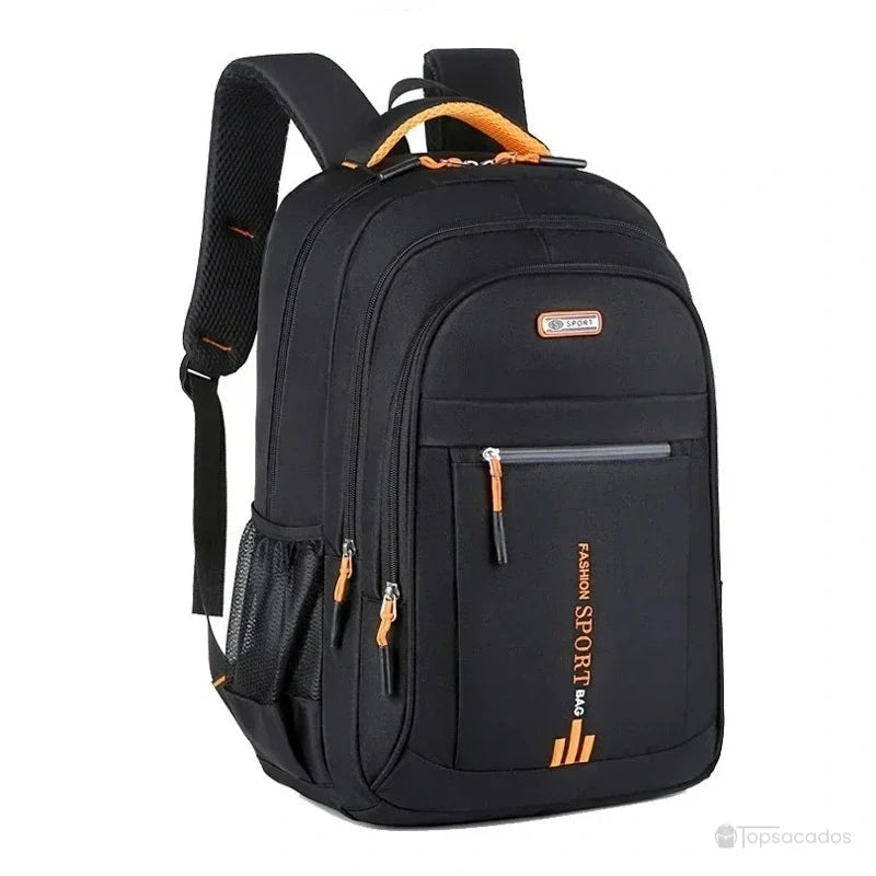 Sac a dos pour cours noir avec accents orange, compartiments spacieux et sangles matelassées visibles.