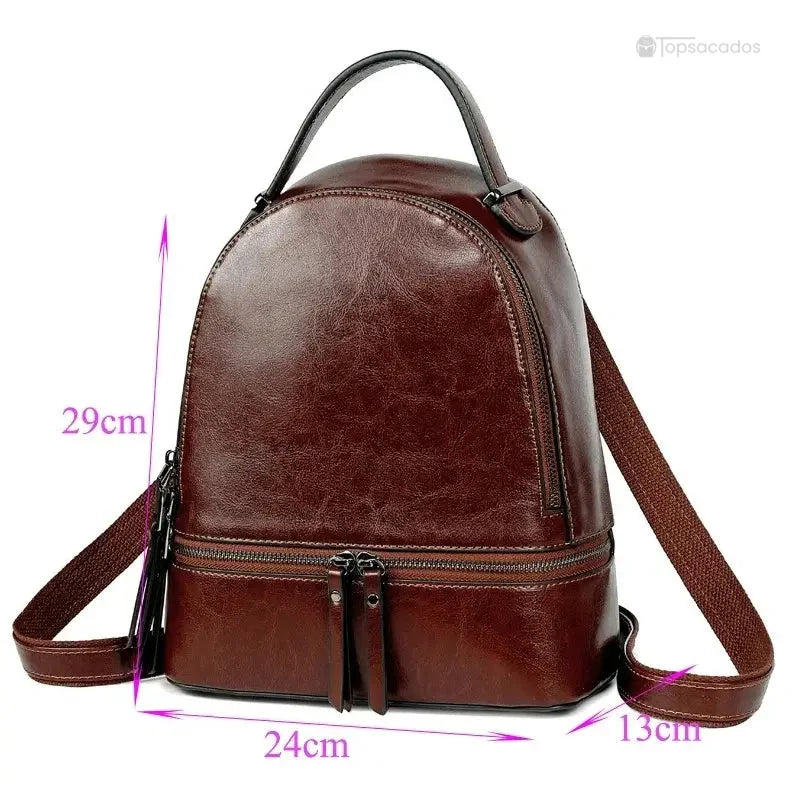 Sac à dos pour femme en cuir marron foncé, présenté avec ses dimensions 29 cm de hauteur, 24 cm de largeur et 13 cm de profondeur.