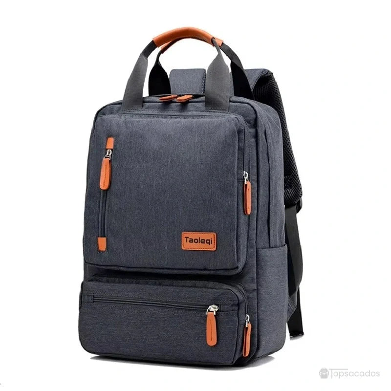 Sac à dos pour lycéen en tissu gris foncé avec poignées et fermetures orange, vue de face sur fond neutre.