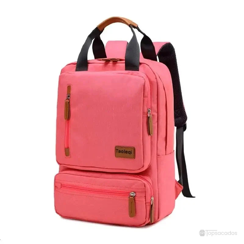 Sac à dos pour lycéen rose vif avec multiples compartiments et bretelles ergonomiques pour un port agréable.