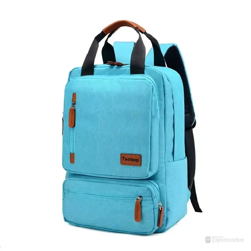 Sac à dos pour lycéen bleu ciel avec fermeture éclair contrastée et poignées supérieures marron.