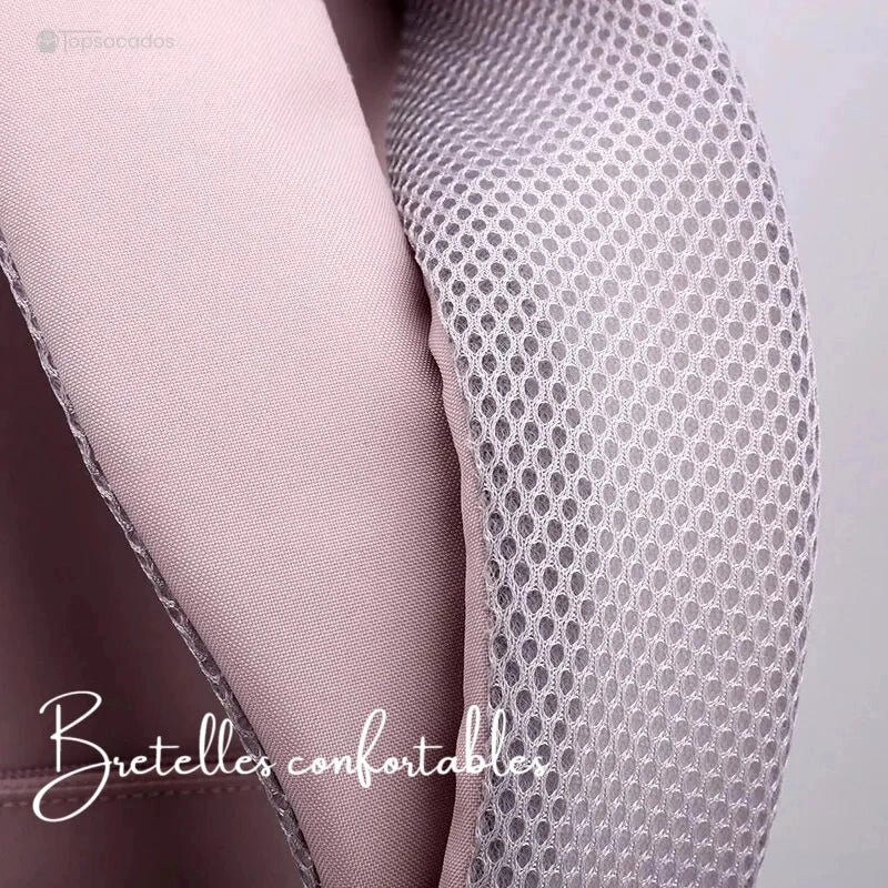 Sac à dos primaire fille avec zoom sur les bretelles rembourrées et tissu respirant gris.