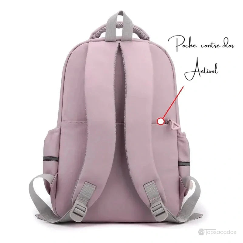 Sac à dos primaire fille vu de dos, avec bretelles rembourrées et poche antivol dissimulée.