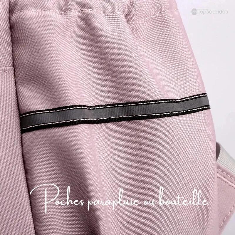 Sac à dos primaire fille avec gros plan sur les poches latérales pour bouteille ou parapluie.