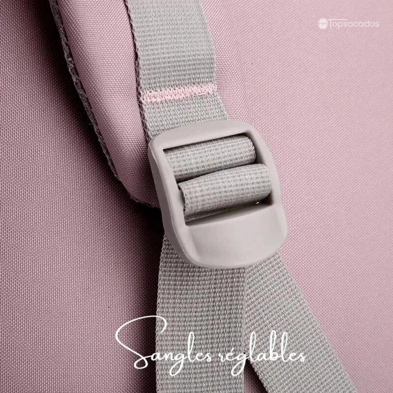 Sac à dos primaire fille avec zoom sur une sangle de réglage grise robuste et boucle ajustable.