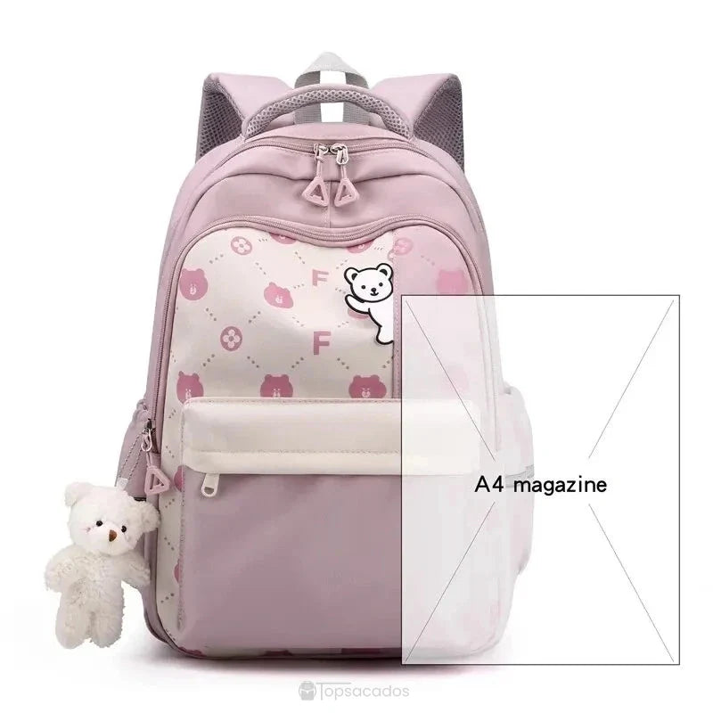 Sac à dos primaire fille rose avec motif d'ours et poche avant, présenté sur fond blanc.
