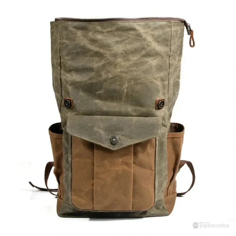 Sac à dos rolltop vintage homme ouvert, montrant le compartiment principal déployé en toile kaki et marron
