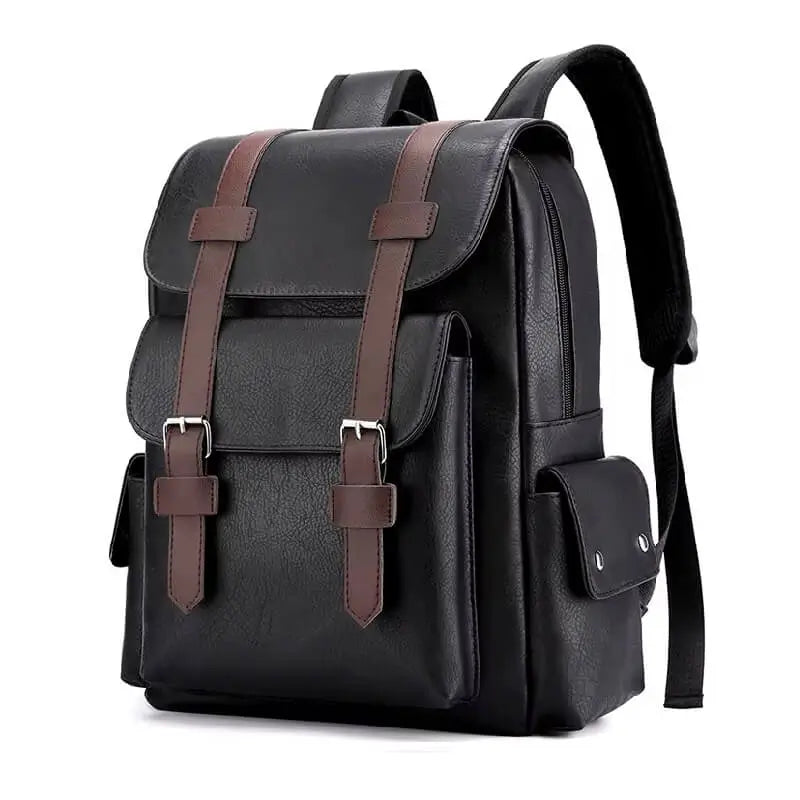 Sac à dos simili cuir noir avec finitions marron et rabat à boucles métalliques, photographié en position debout sur fond blanc.