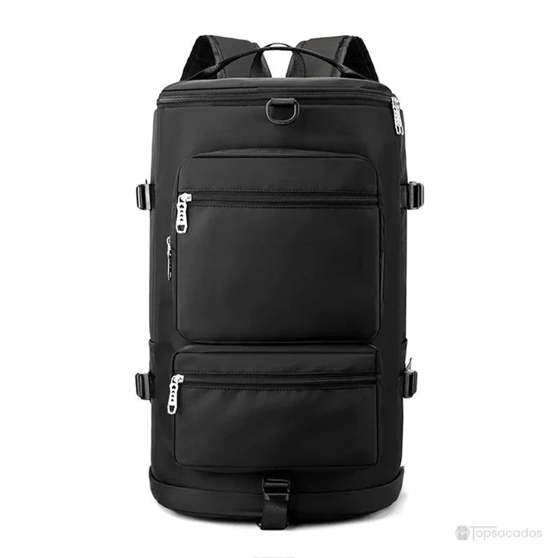 Sac à dos sport grand volume noir présenté de face, avec doubles fermetures zippées et design rectangulaire rigide.