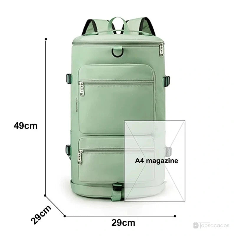 Sac à dos sport grand volume vert affichant ses dimensions : 49 cm de haut et 29 cm de large, avec format adapté à un magazine A4.