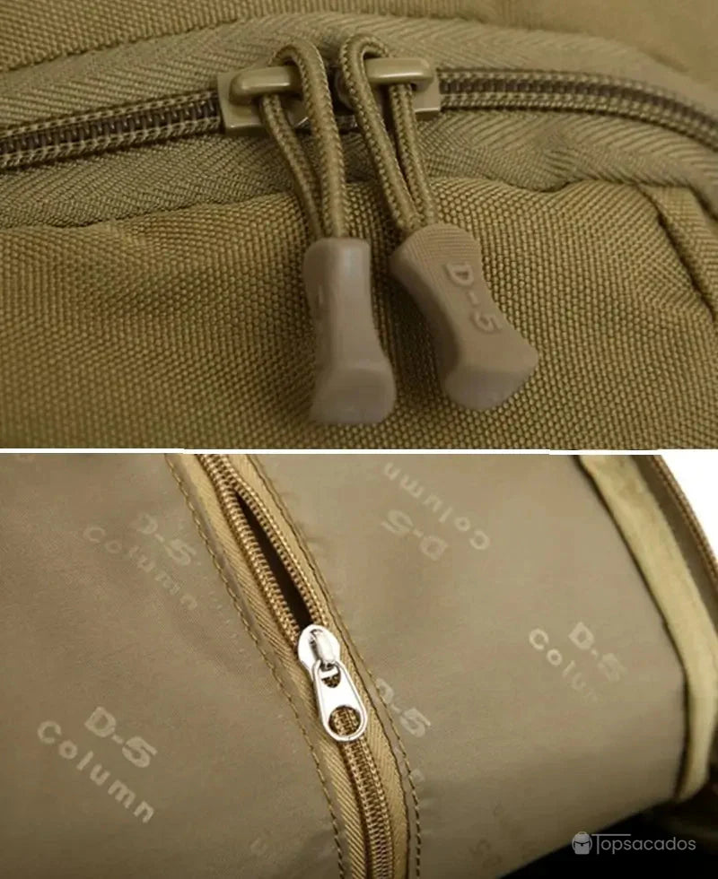 Sac à dos style militaire Femme avec focus sur les fermetures éclair et l’intérieur doublé.