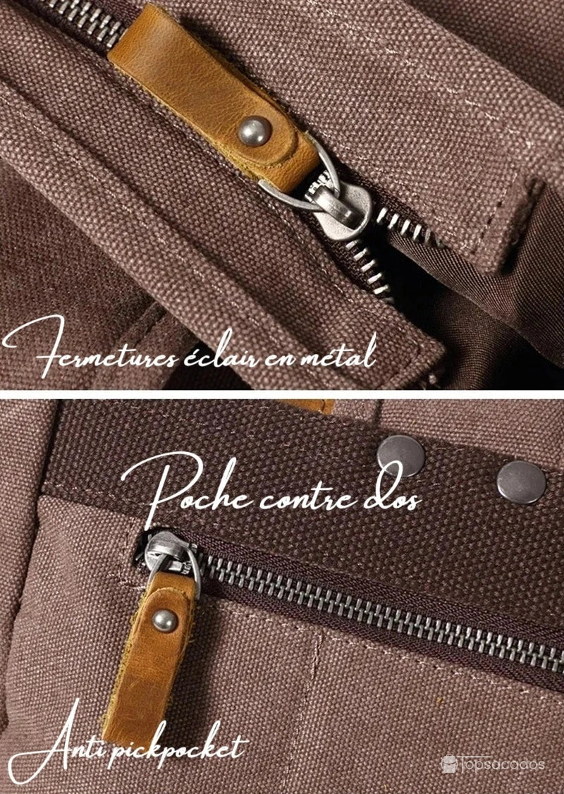 Sac à dos toile Rolltop vu de dos avec poche zippée anti-pickpocket en métal, sécurisée par un rabat en cuir élégant.