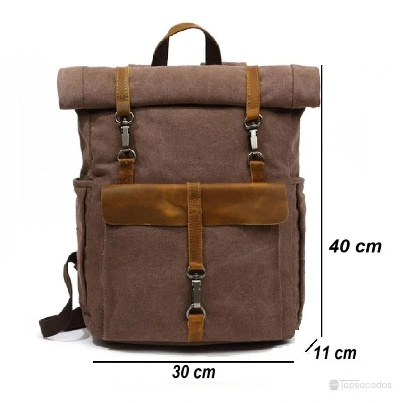 Sac à dos toile Rolltop marron avec dimensions annotées 30x40x11 cm, illustrant sa capacité compacte et fonctionnelle.
