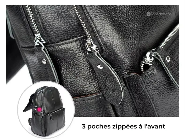 sac à dos ville femme noir doté de trois poches zippées à l’avant, en cuir grainé avec détails métalliques brillants