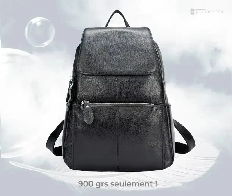 sac à dos ville femme noir léger de 900 grammes, posé sur une plume blanche pour illustrer sa légèreté et son confort