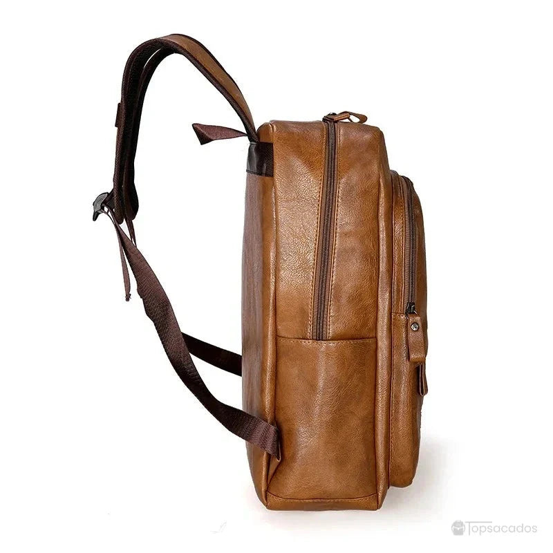Sac à dos ville homme vu de profil avec deux compartiments zippés et bretelles ajustables ergonomiques.