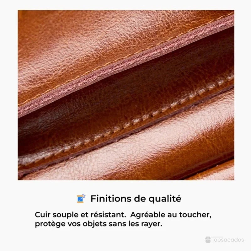 Sac à dos vintage pour femme, zoom sur le cuir souple et les coutures solides, illustrant la qualité de fabrication et la résistance des matériaux.