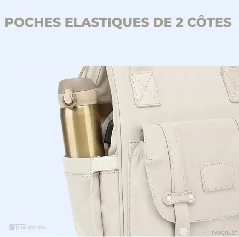 Sac à langer à dos avec poches latérales élastiques, illustré avec une gourde insérée.