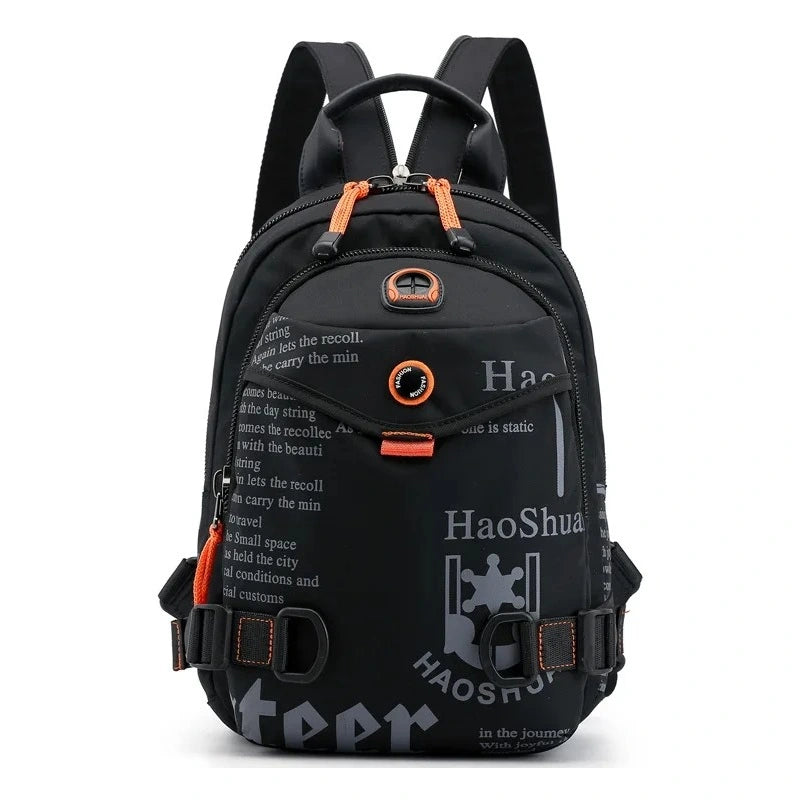 Petit Sac à dos noir avec imprimés blancs et détails orange, photographié de face sur fond blanc, avec poignée et sangles visibles