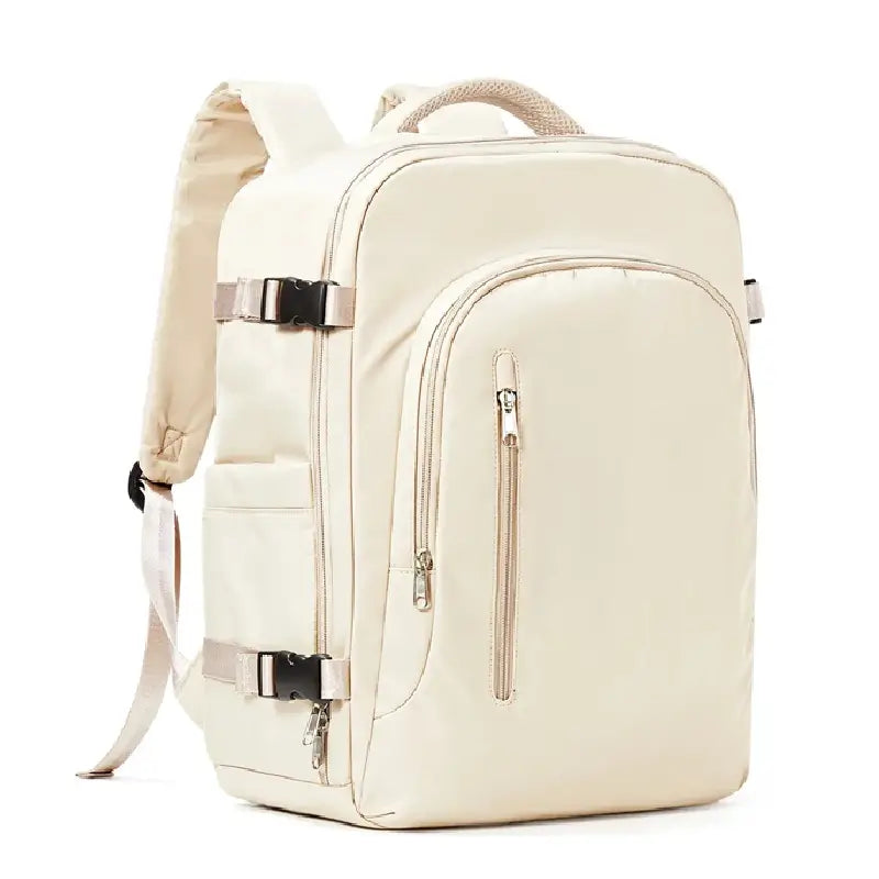 Sac à dos 30 litres beige vu de trois quarts, avec poches multiples et sangles latérales, sur fond blanc