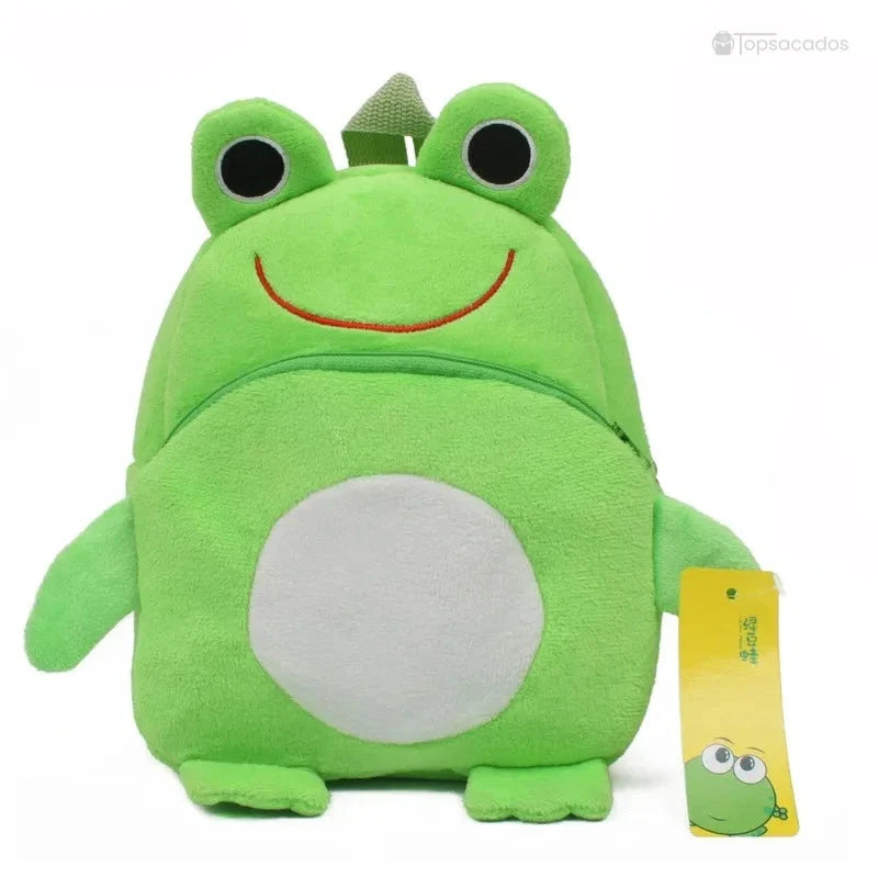 Sac à dos Bébé vert vif en forme de grenouille avec grands yeux ronds, sourire brodé et étiquette assortie.