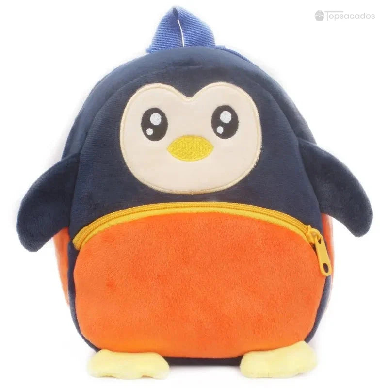 Sac à dos Bébé noir et orange en forme de pingouin souriant, avec fermeture éclair jaune et yeux brillants.