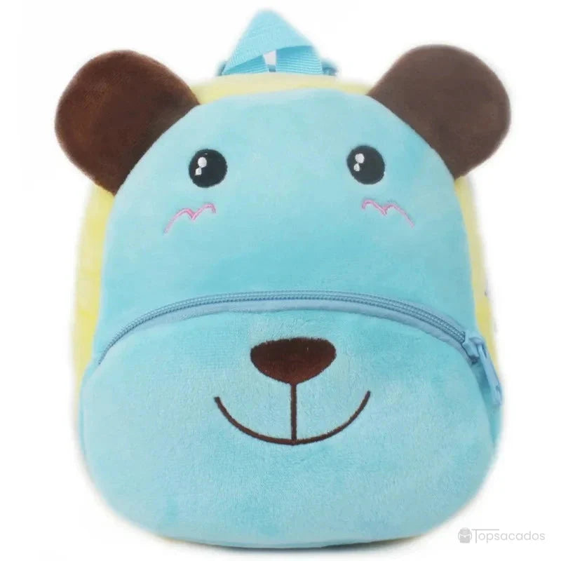 Sac à dos Bébé en peluche bleu ciel avec oreilles marron, visage d’ours souriant et fermeture assortie.