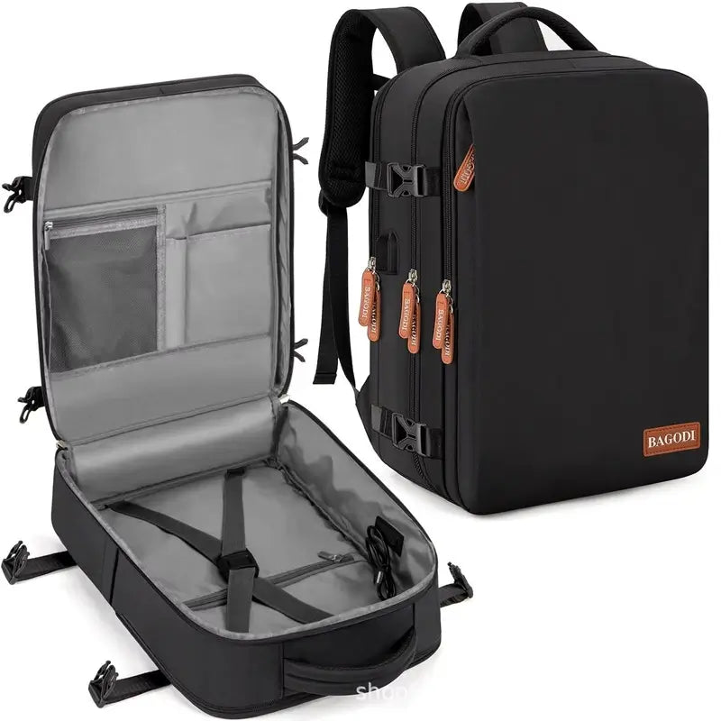 sac a dos cabine noir ouvert avec intérieur compartimenté, sangles de maintien et multiples poches de rangement.