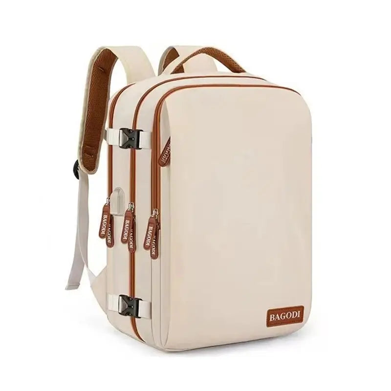 sac a dos cabine rigide beige avec finitions marron, doté de multiples fermetures zippées visibles, idéal pour le voyage en avion.