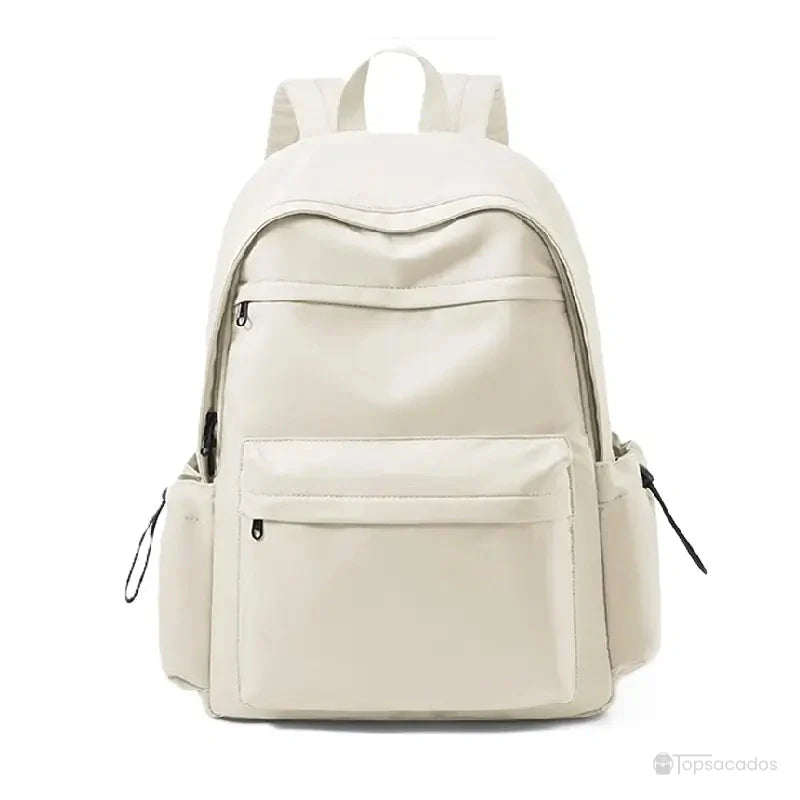 Sac à dos collège fille beige avec grandes poches avant, parfait pour un usage scolaire quotidien.